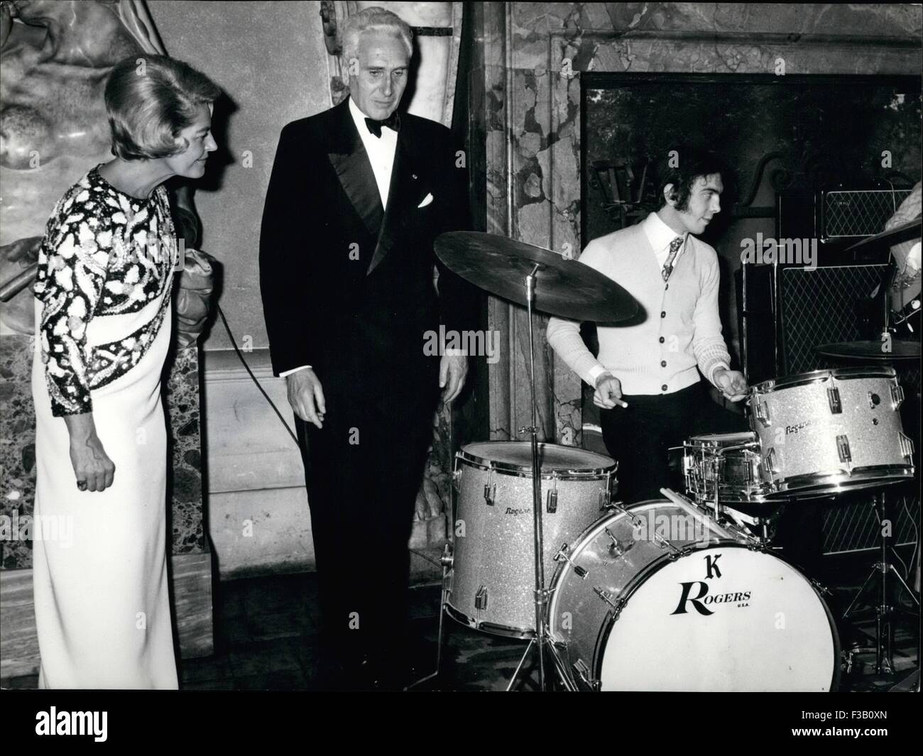 April 1967. 26th Dec, 1979. Pierre Cardin the famous Paris dress maker, presented his collection ''Spring 1967'' to the French Embassy in Rome. Palazzo Franese. Photo shows French ambassador Armand Berard controls the Orchestra. © Keystone Pictures USA/ZUMAPRESS.com/Alamy Live News Stock Photo