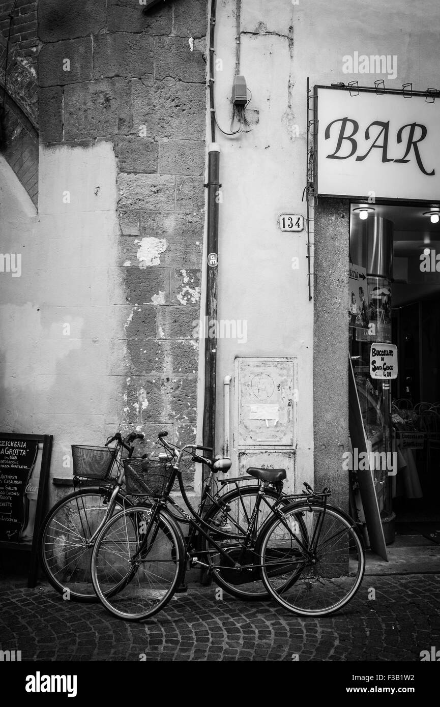 Bicycles outside a bar/restaurant, Old Town, Lucca, Tuscany, Italy ...