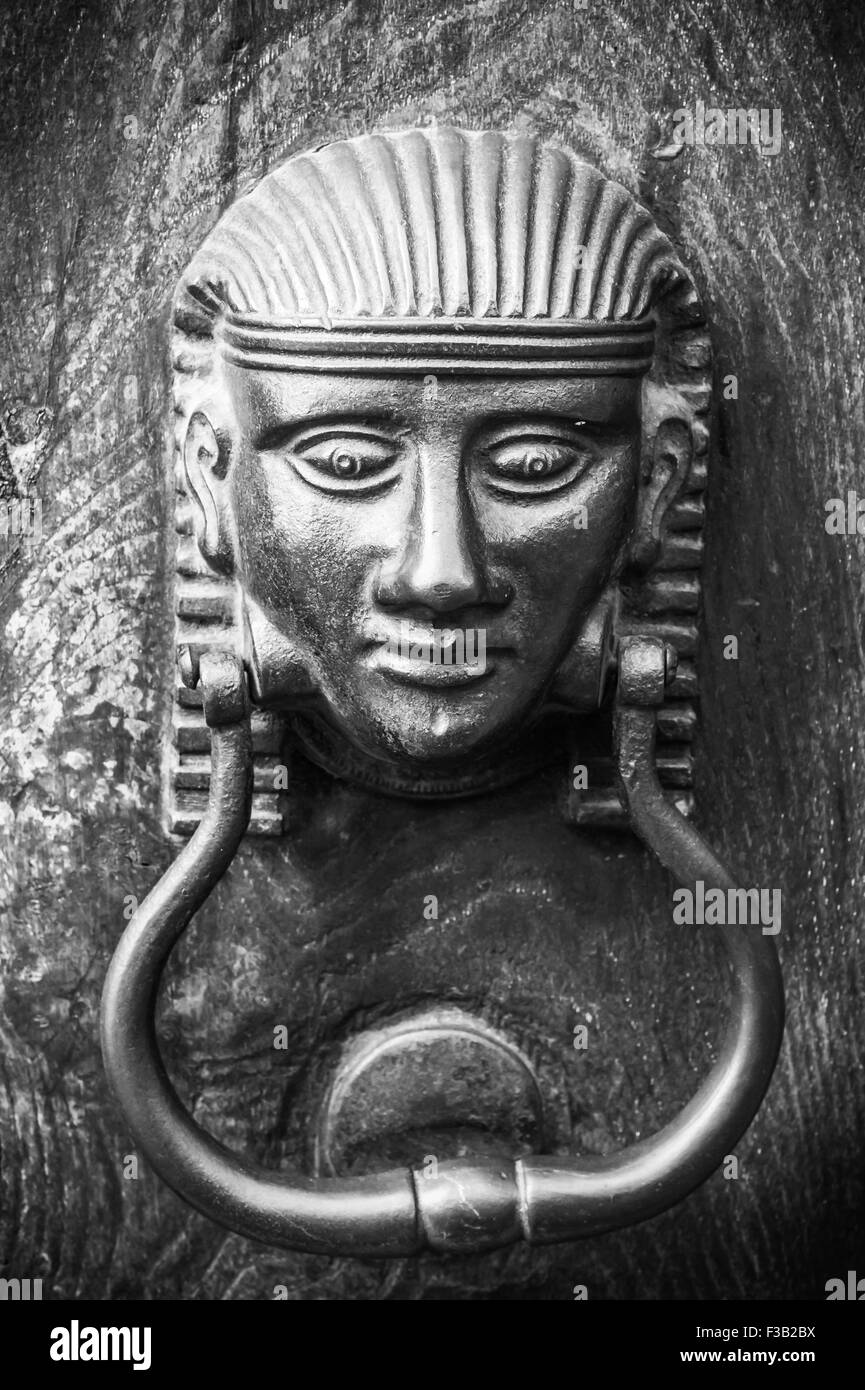 Egyptian figure, Door knocker, Volterra, Tuscany, Italy Stock Photo