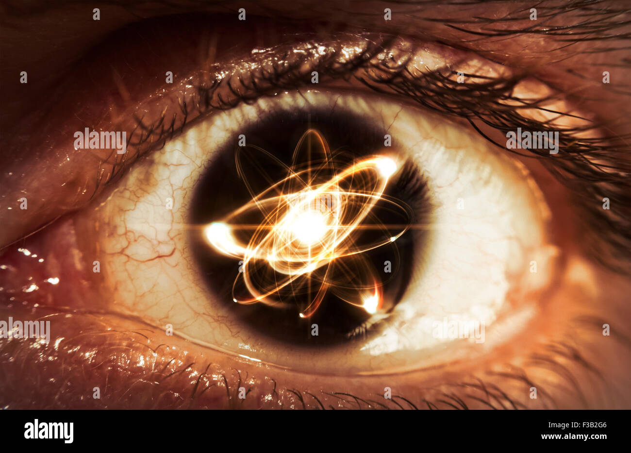 Atomic particle reflection in the pupil of an eye for physics