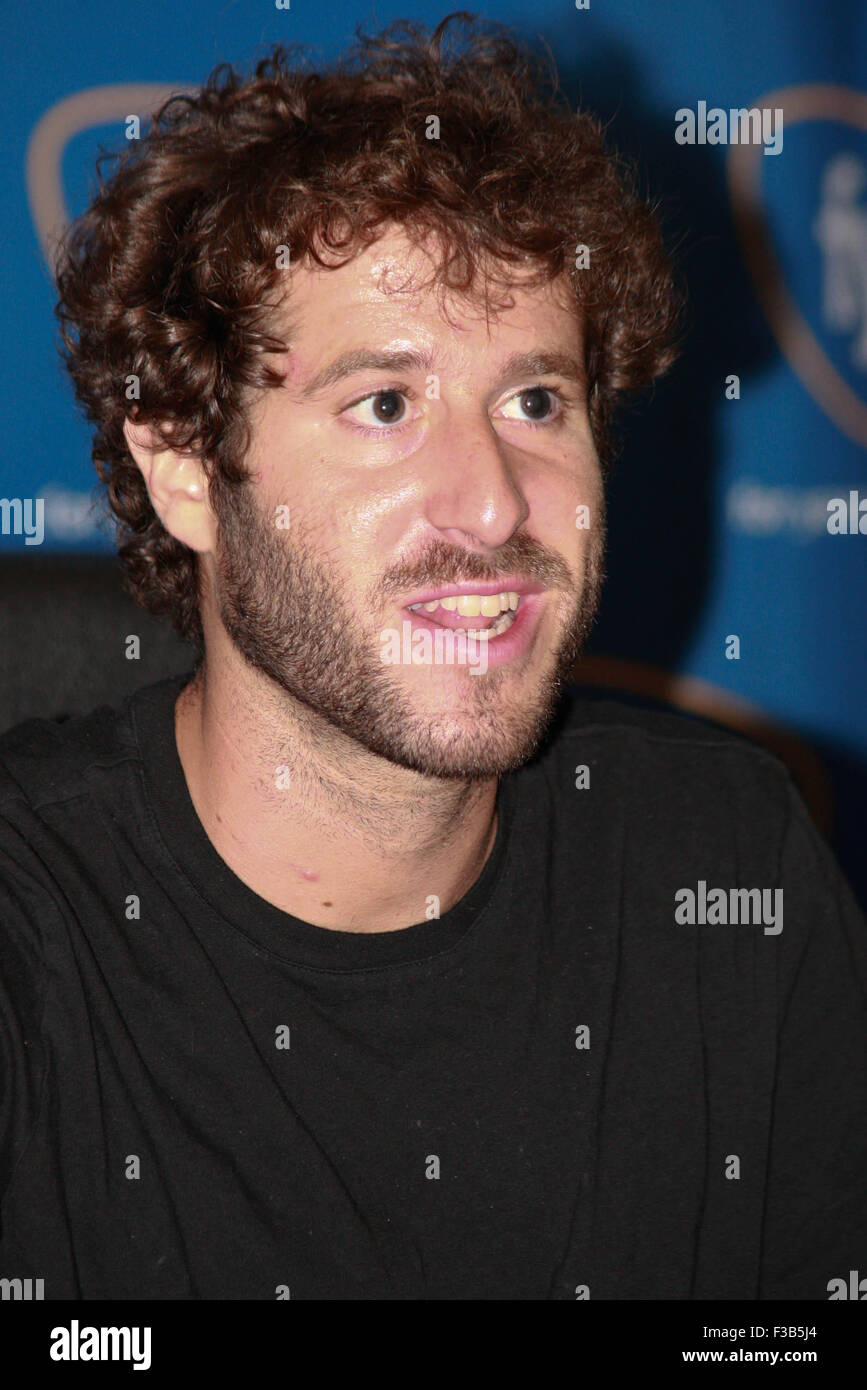 Rapper Lil Dicky signs copies of his new album 'Professional Rapper' at