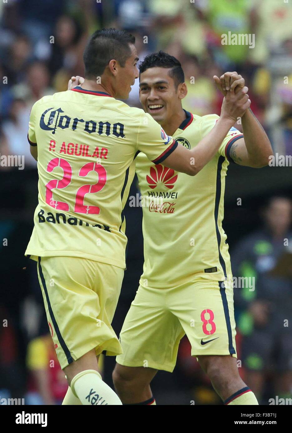 Mexico City, Mexico. 3rd Oct, 2015. America's Paul Aguilar (L) celebrates scoring during the match against Jaguares of the 2015 Opening Tournament of the MX League held in the Azteca Stadium, in Mexico City, capital of Mexico, on Oct. 3, 2015. America won the match 2-1. © Jorge Rios/Xinhua/Alamy Live News Stock Photo