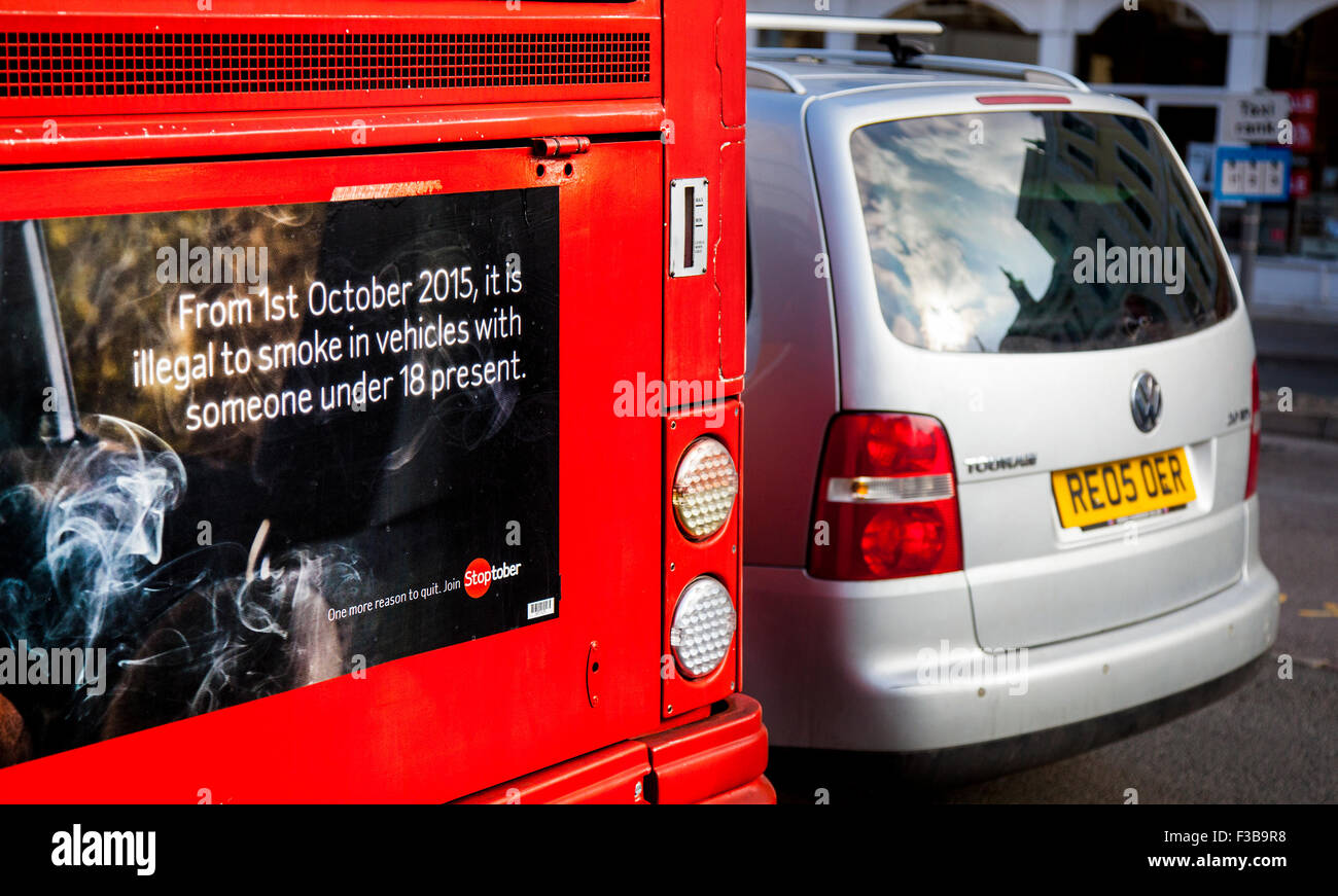 Cirencester, Gloucestershire, UK. 3rd October, 2015. Rules Emissions inside and outside motor vehicles. From the 1st October 2015 it will be illegal to smoke in a private vehicle when there are children present. This is new legislation to protect children and young people from the dangers of second-hand smoke (SHS). The US Environmental Protection Agency (EPA) said that VW had installed illegal software to cheat emission tests, allowing its used diesel cars to produce traffic fumes up to 40 times more pollution than allowed. Stock Photo