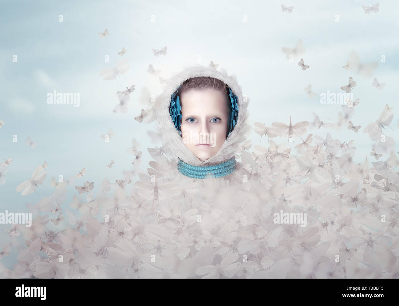 Fantasy. Futuristic Woman with Flying Butterflies Stock Photo