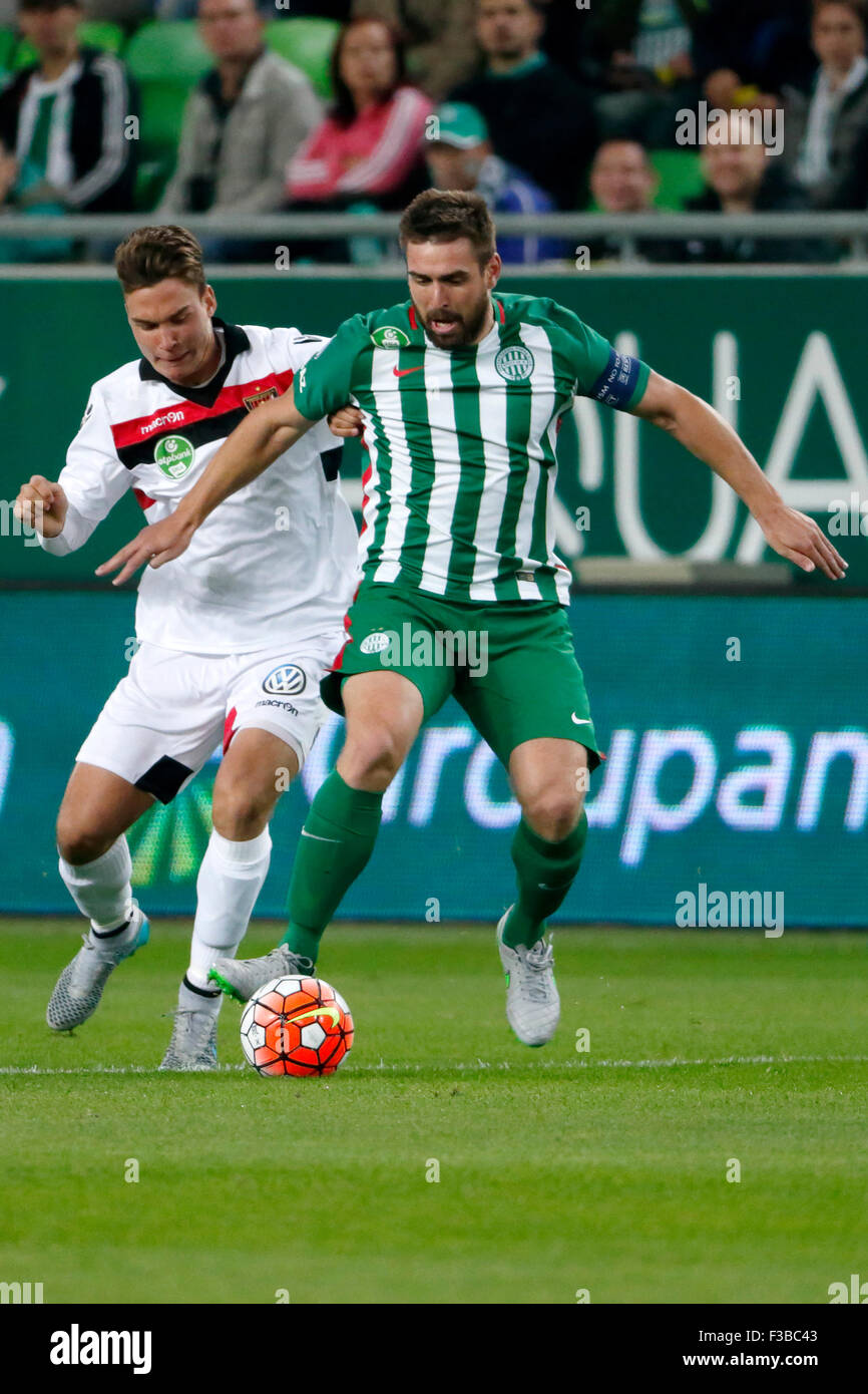 BUDAPEST, HUNGARY - OCTOBER 3, 2015: Duel between Daniel Bode of Ferencvaros (r) and David Bobal of Honved during Ferencvaros vs. Honved OTP Bank League football match in Groupama Arena. Stock Photo