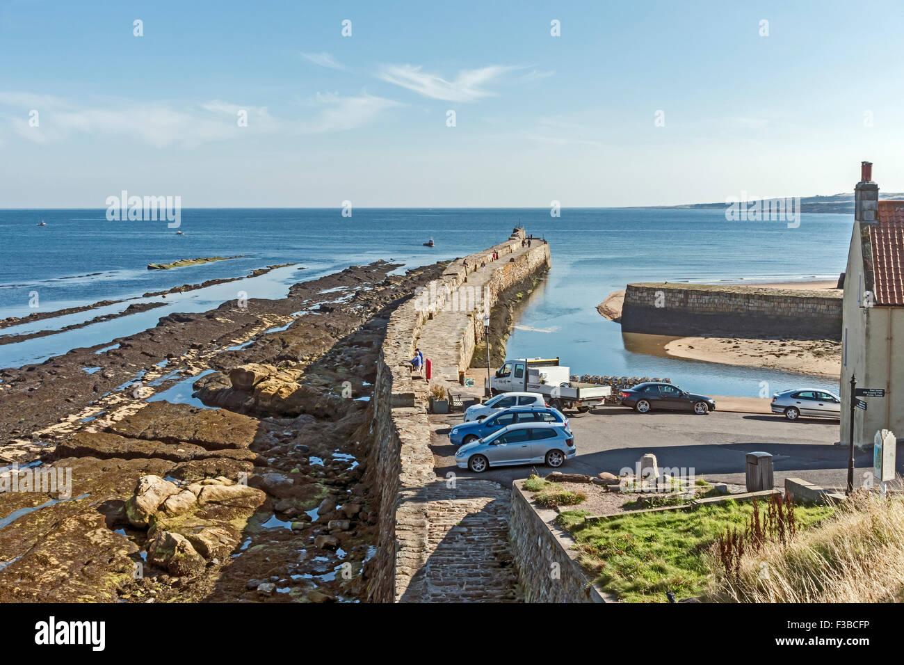 The harbour in St. Andrews Fife Scotland showing the breakwater and harbour entrance Stock Photo