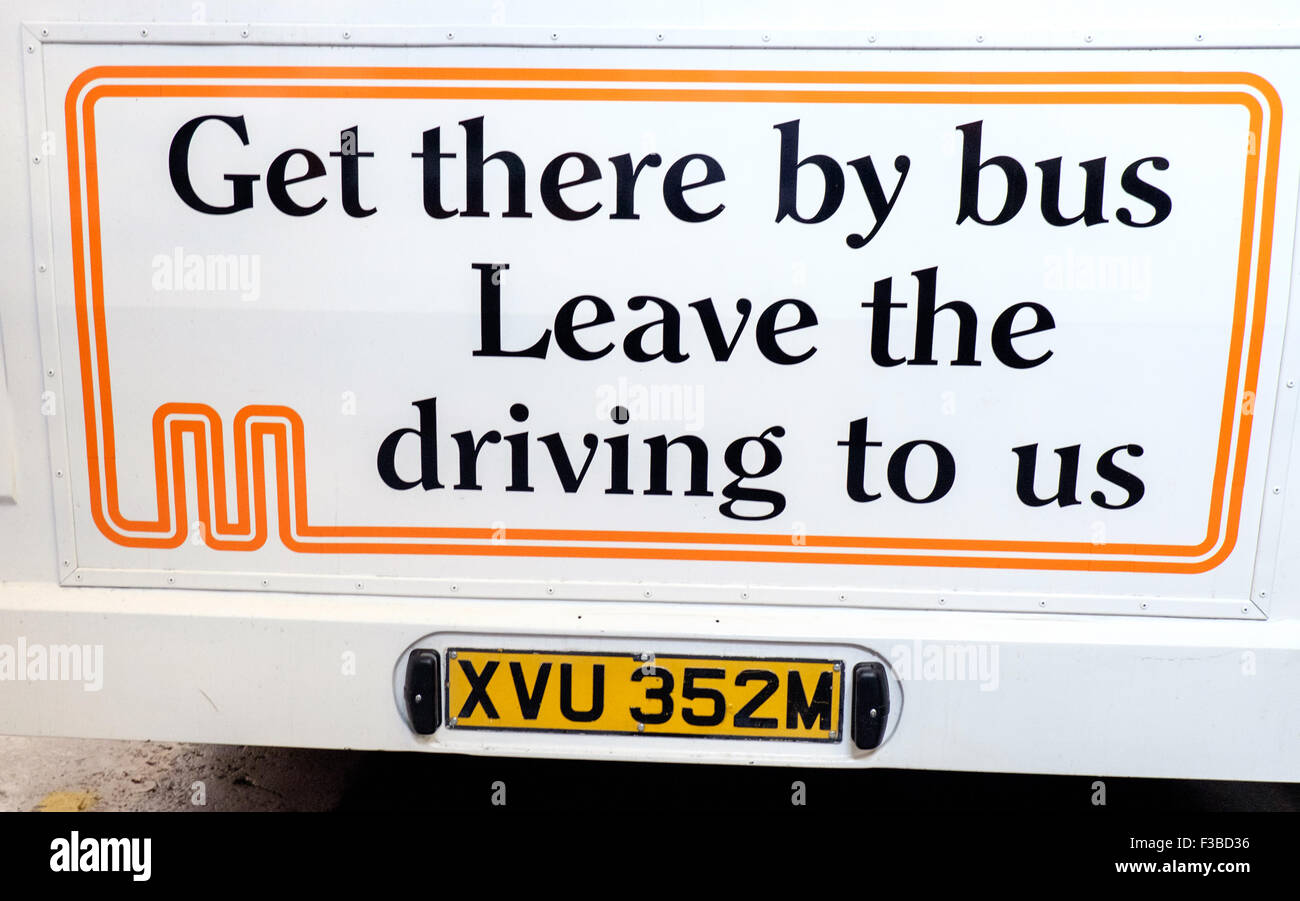 'Get there by bus leave the driving to us' sign on bus at Museum of Transport, Manchester, UK Stock Photo