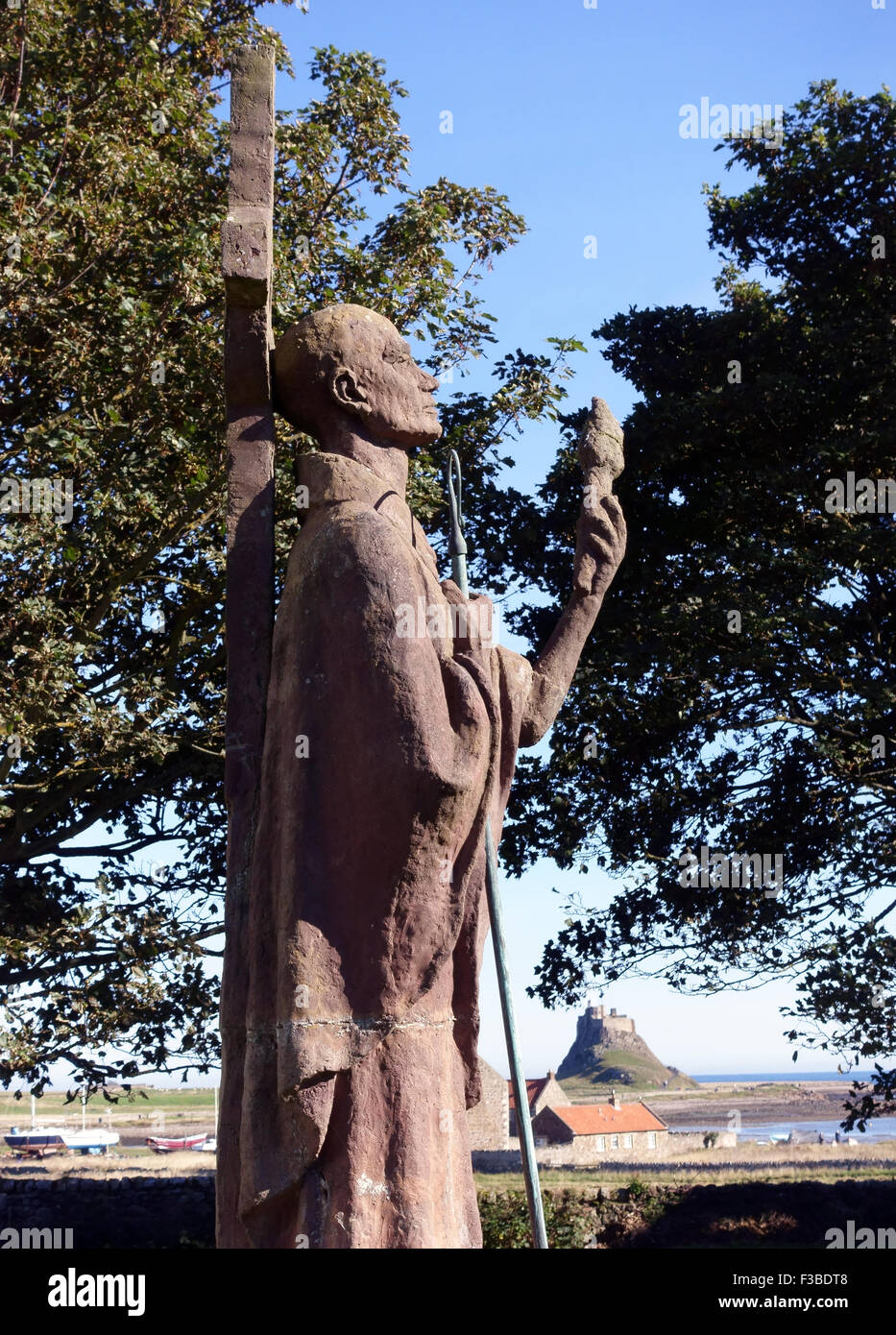 Statue of St Cuthbert of Lindisfarne on Holy Island, England Stock