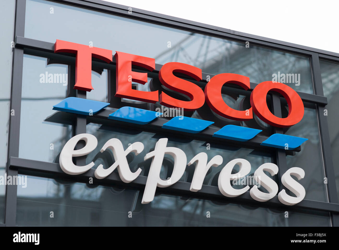 A Tesco Express shop sign logo. Stock Photo