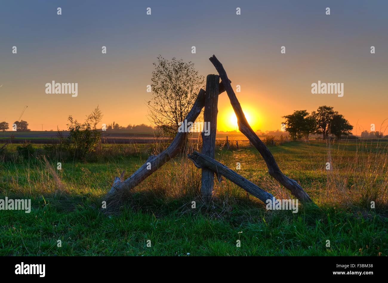 Autumn landscape. Wooden structure and rural landscape at sunset. Stock Photo