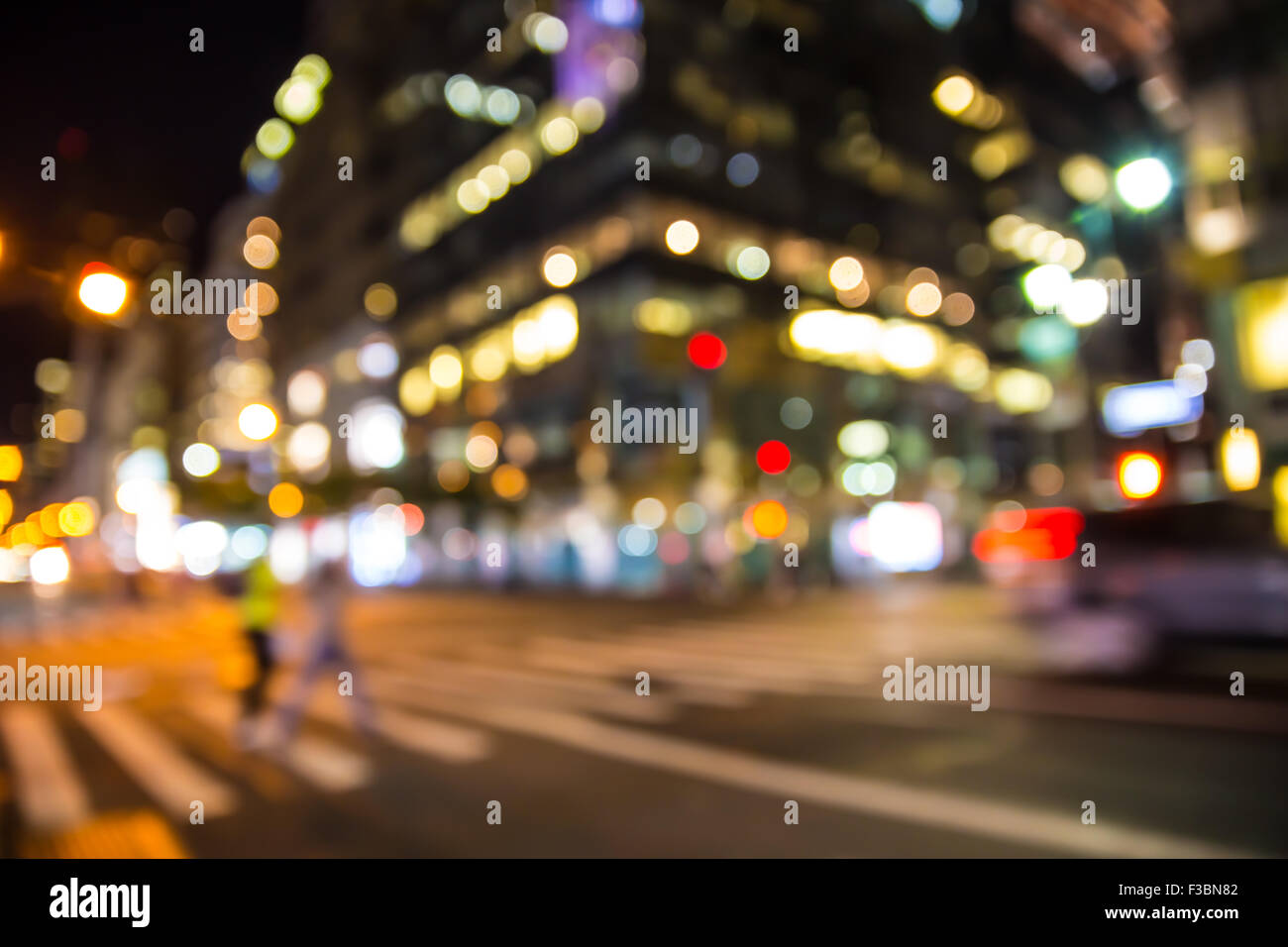 Defocused blur of street in New York City lit at night Stock Photo - Alamy