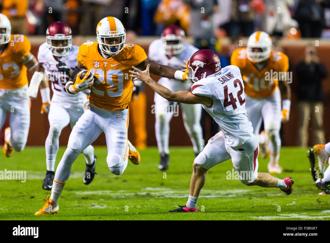 October 03, 2015: Lane Saling #42 of the Arkansas Razorbacks tries to tackle Evan Berry #29 of the Tennessee Volunteers as he returns the opening kick off for a touchdown during the NCAA Football game between the University of Tennessee Volunteers and the Arkansas Razorbacks at Neyland Stadium in Knoxville, TN Tim Gangloff/CSM Stock Photo
