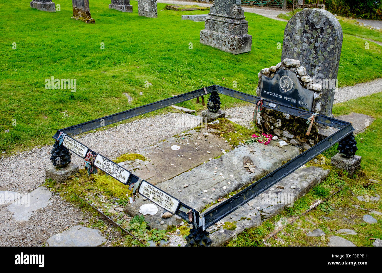 Tomb of Rob Roy McGregor, his wife and son in Balquhidder Kirk Graveyard in the Trossachs, Scotland Stock Photo
