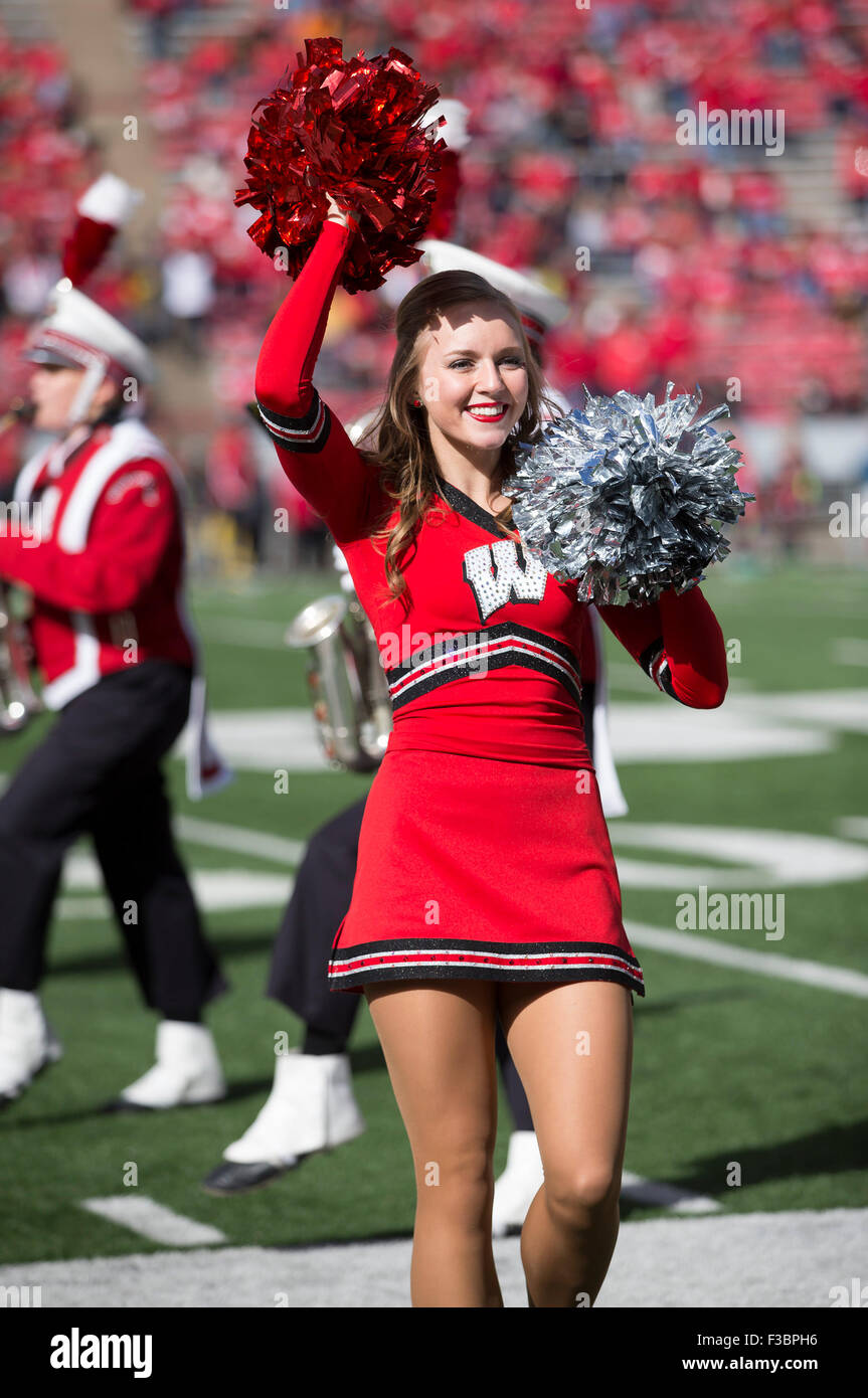 Madison, WI, USA. 3rd Oct, 2015. A cheerleader entertains the crowd before the NCAA Football game between the Iowa Hawkeyes and the Wisconsin Badgers at Camp Randall Stadium in Madison, WI. John Fisher/CSM/Alamy Live News Stock Photo