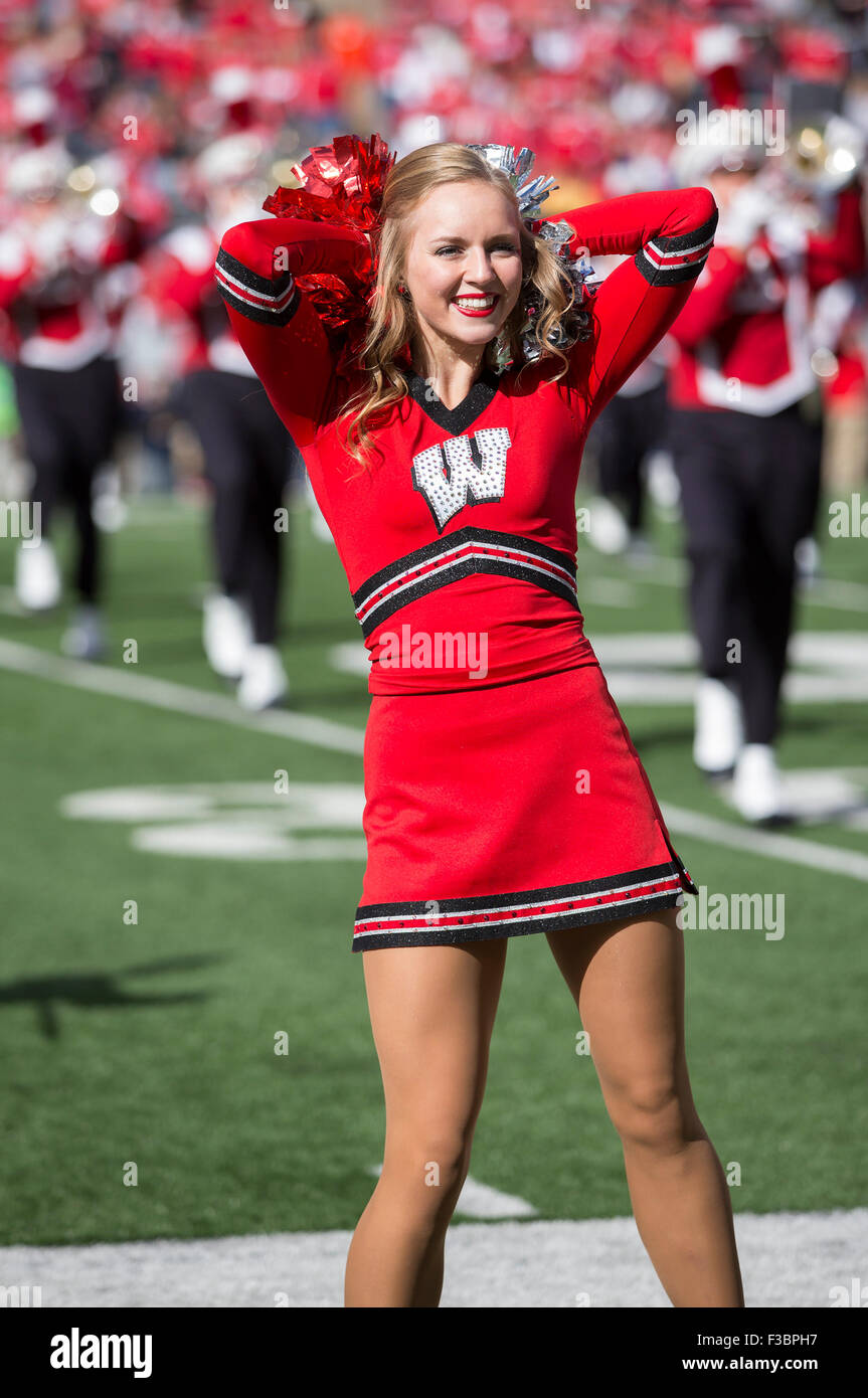 Madison, WI, USA. 3rd Oct, 2015. A cheerleader entertains the crowd before the NCAA Football game between the Iowa Hawkeyes and the Wisconsin Badgers at Camp Randall Stadium in Madison, WI. John Fisher/CSM/Alamy Live News Stock Photo