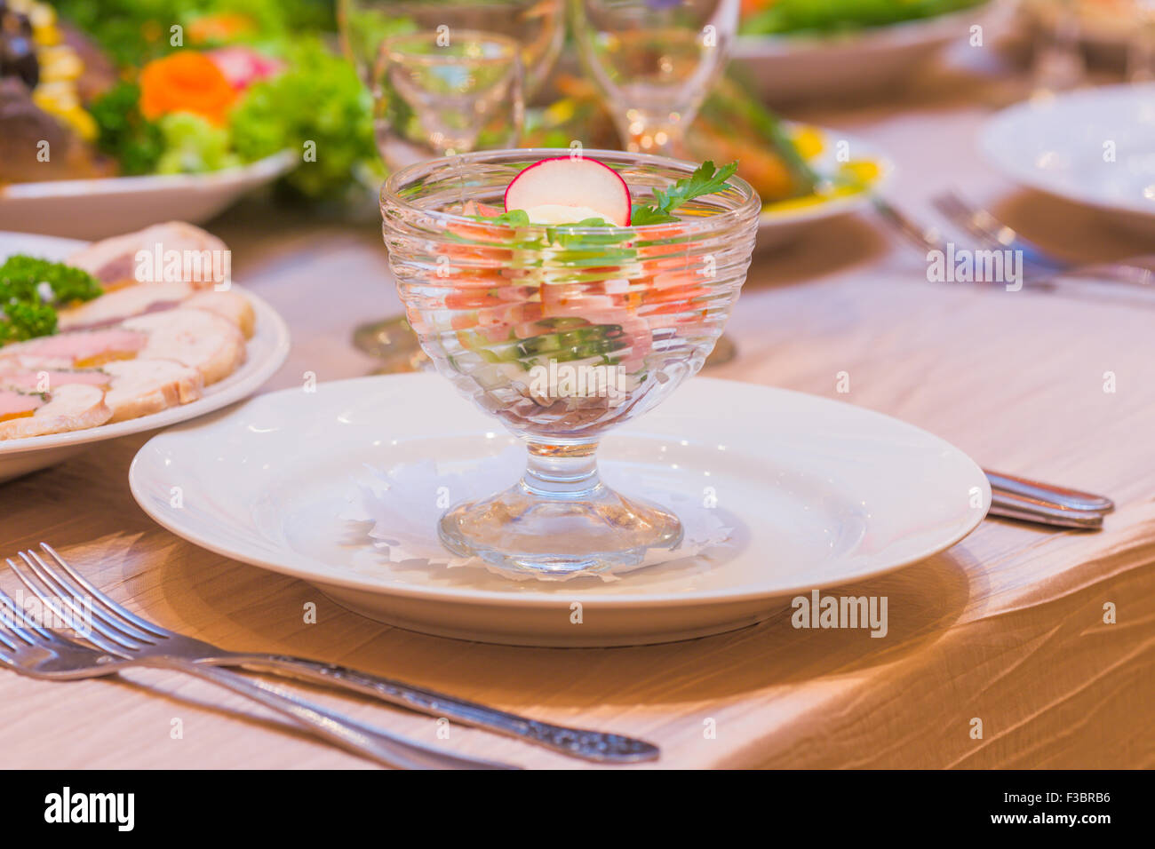 Served table banquet food meal dish plate restaurant Stock Photo
