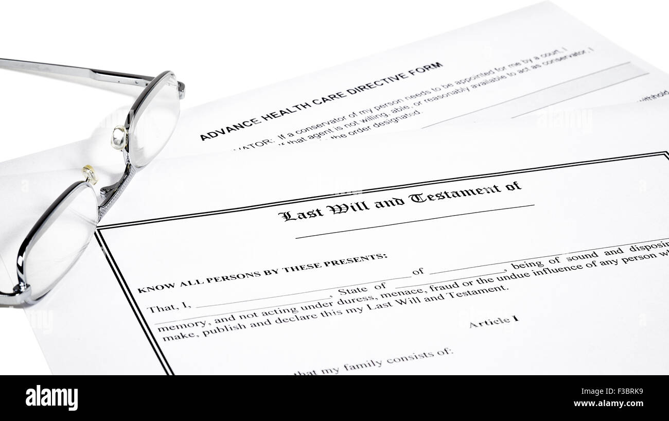 Last Will and Testament with Medical Directive Form and Reading glasses isolated on white Stock Photo