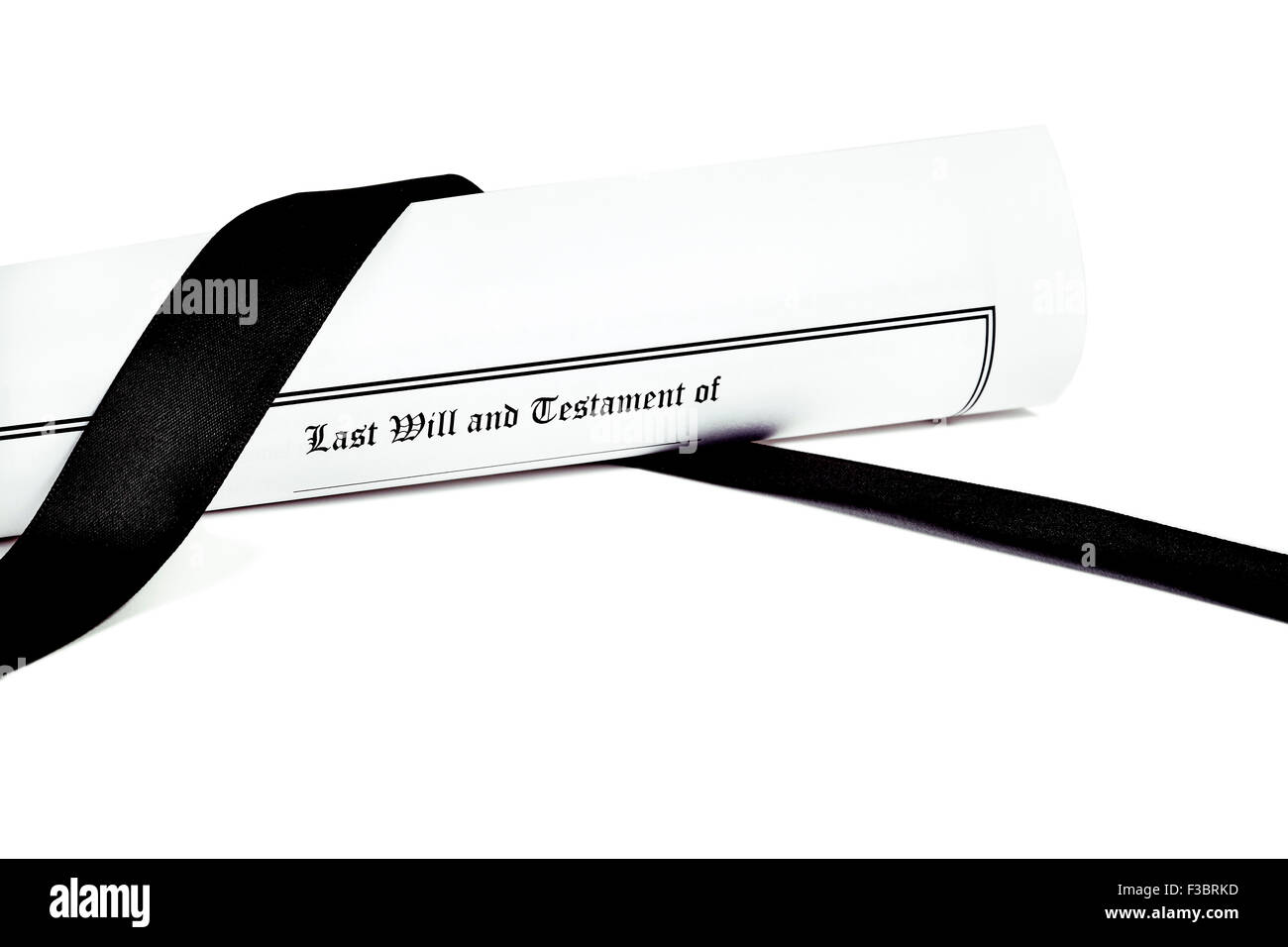 Last Will and Testament rolled up with black ribbon isolated on white Stock Photo