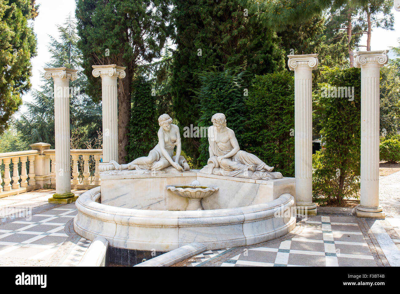 White marble garden sculpture in antique greek style Stock Photo Alamy