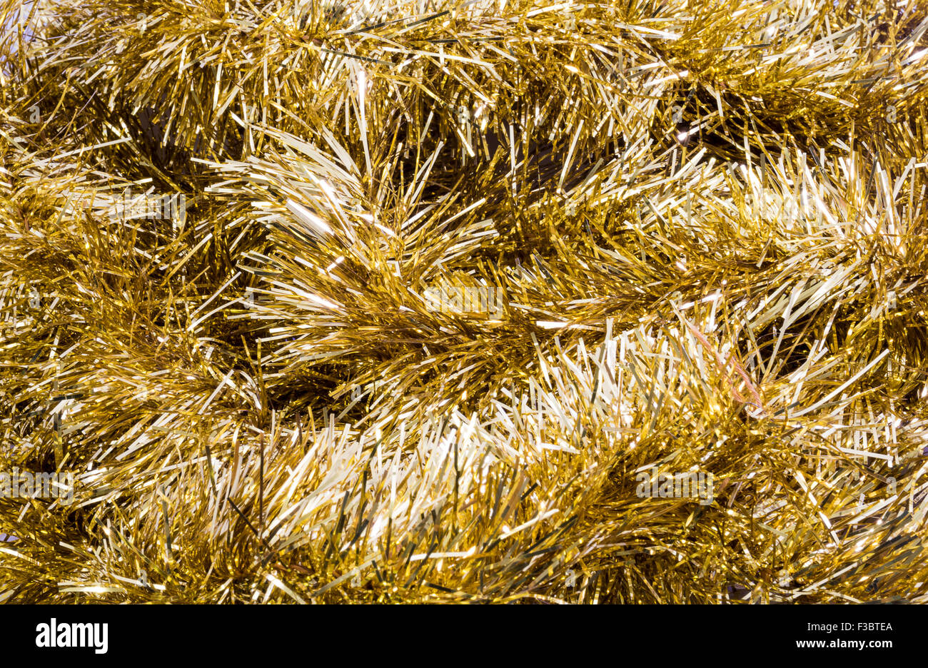 Gold Tinsel background Stock Photo