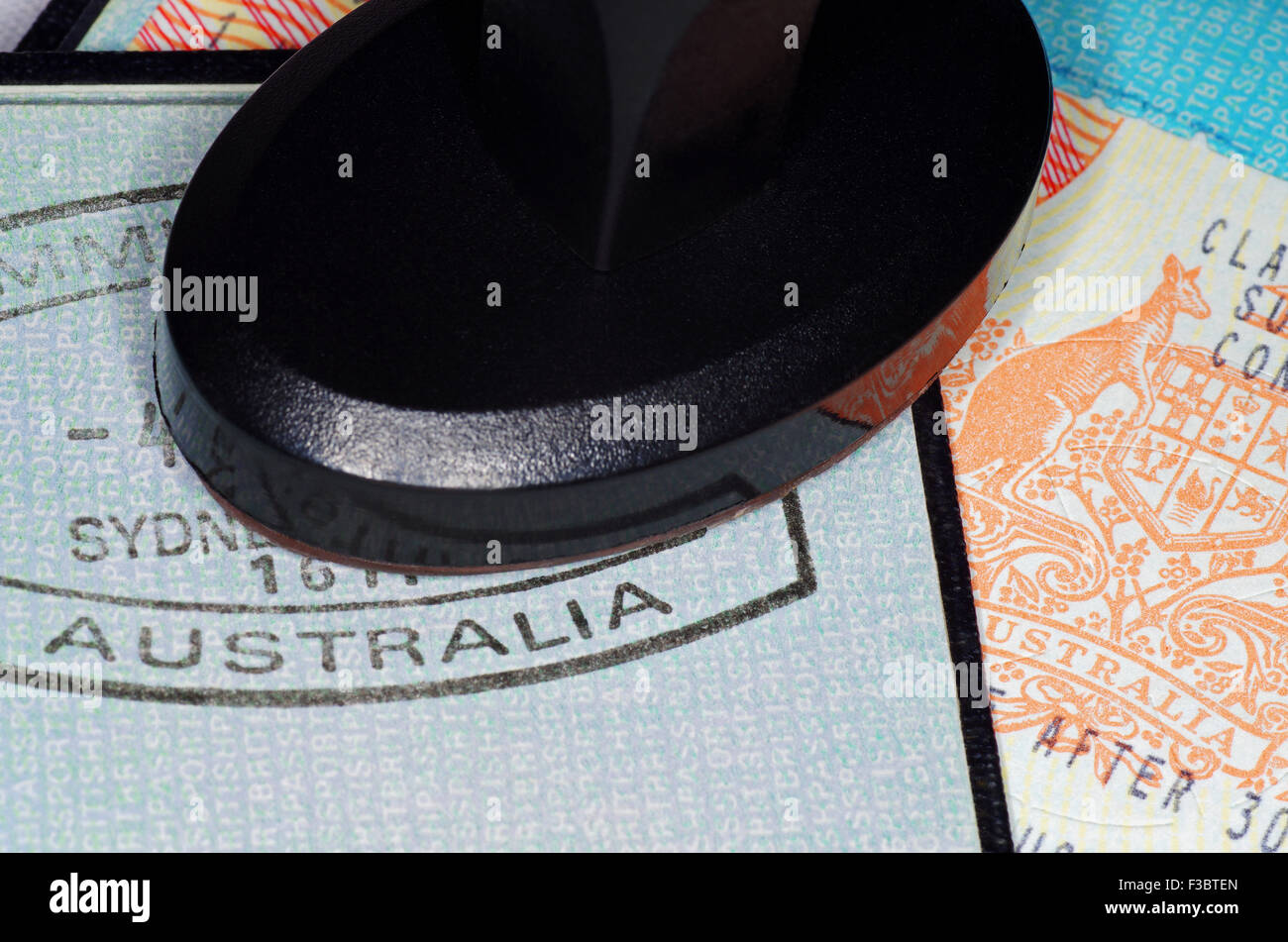 australian travel documents and stamping tool for immigration passport control Stock Photo