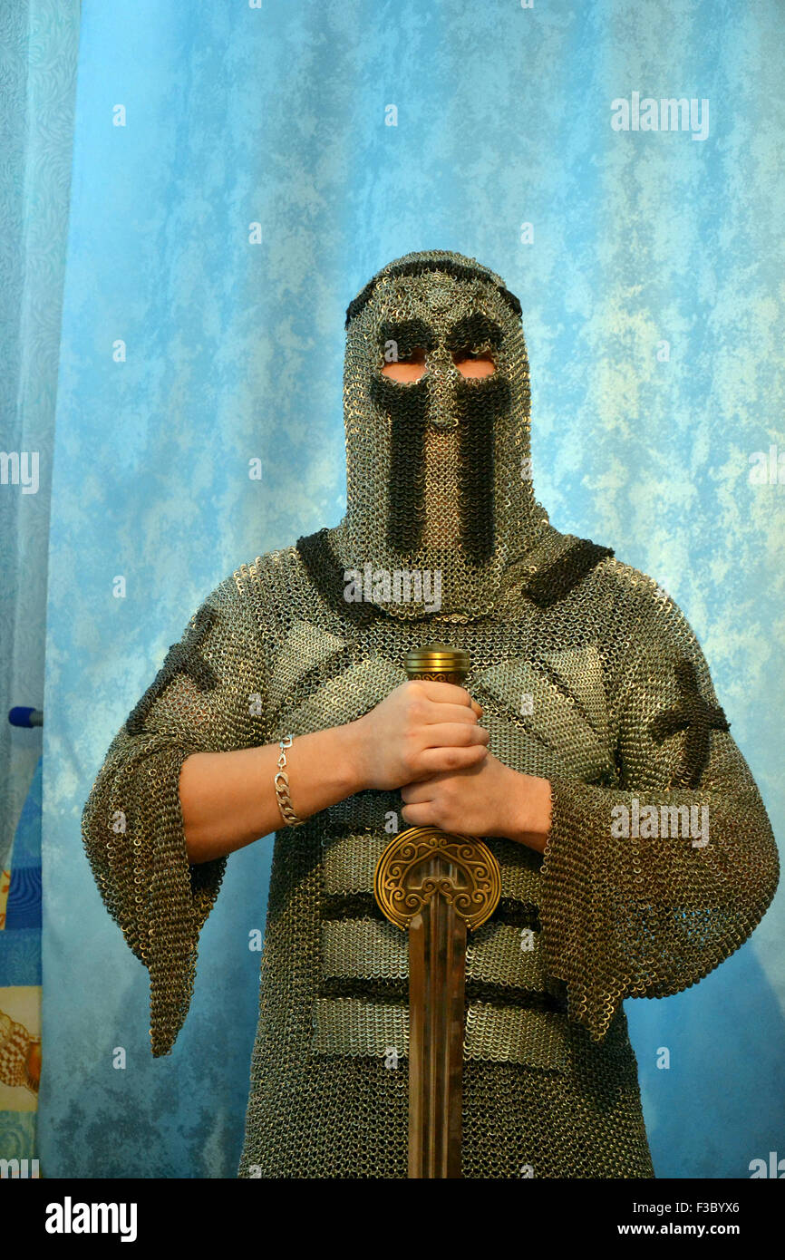 Knightly chain armor and sword. Fitting of a knightly armor Stock Photo