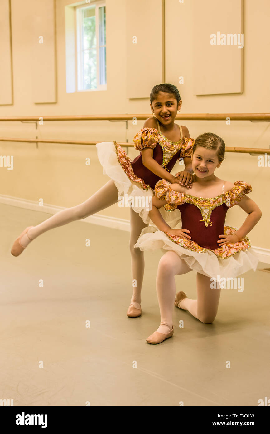 Seven year old girls at a ballet dance dress rehearsal in a studio in