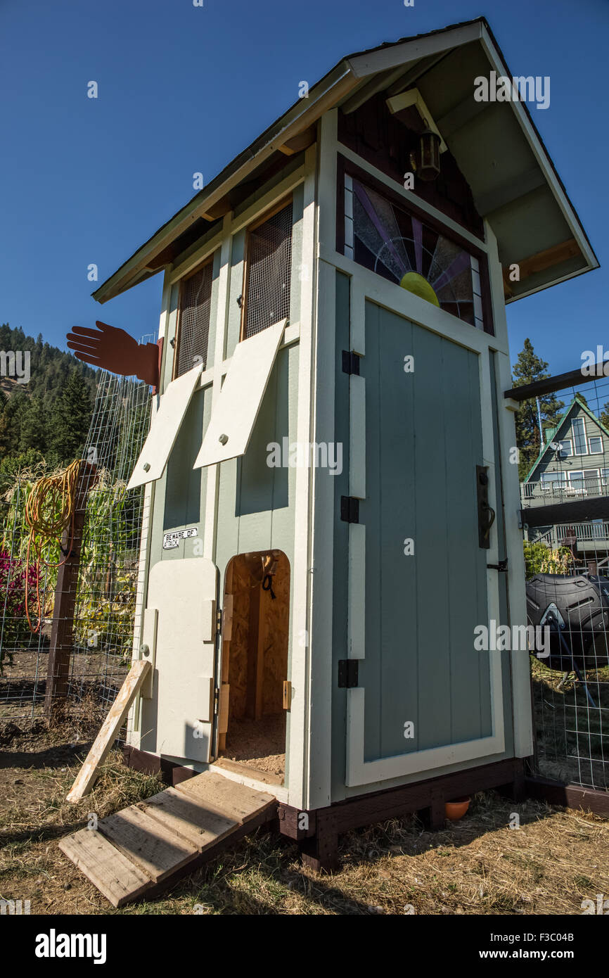Custom-built duck house, including the stained glass windows, for four Indian Runner ducks in Leavenworth, Washington, USA Stock Photo
