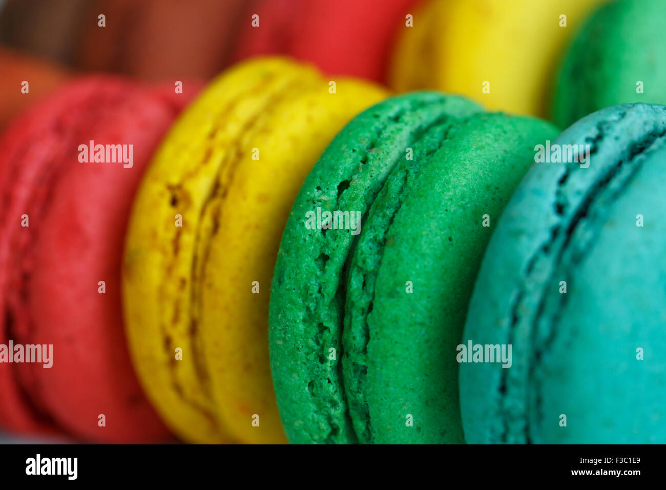 Colourful tasty macaroons in a row Stock Photo