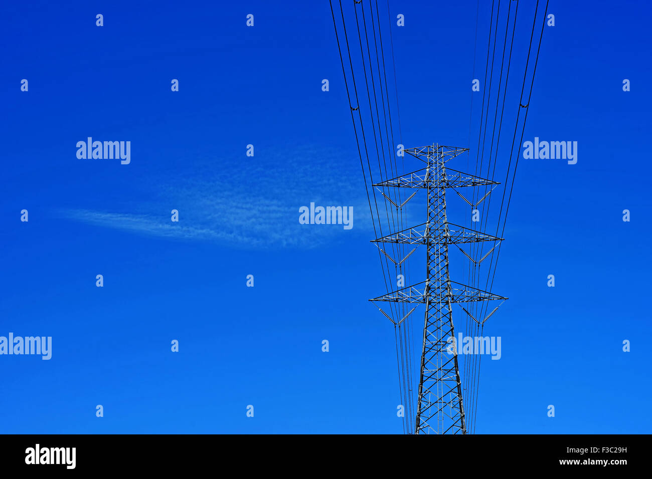 High voltage electric tower on beautiful sky background Stock Photo - Alamy