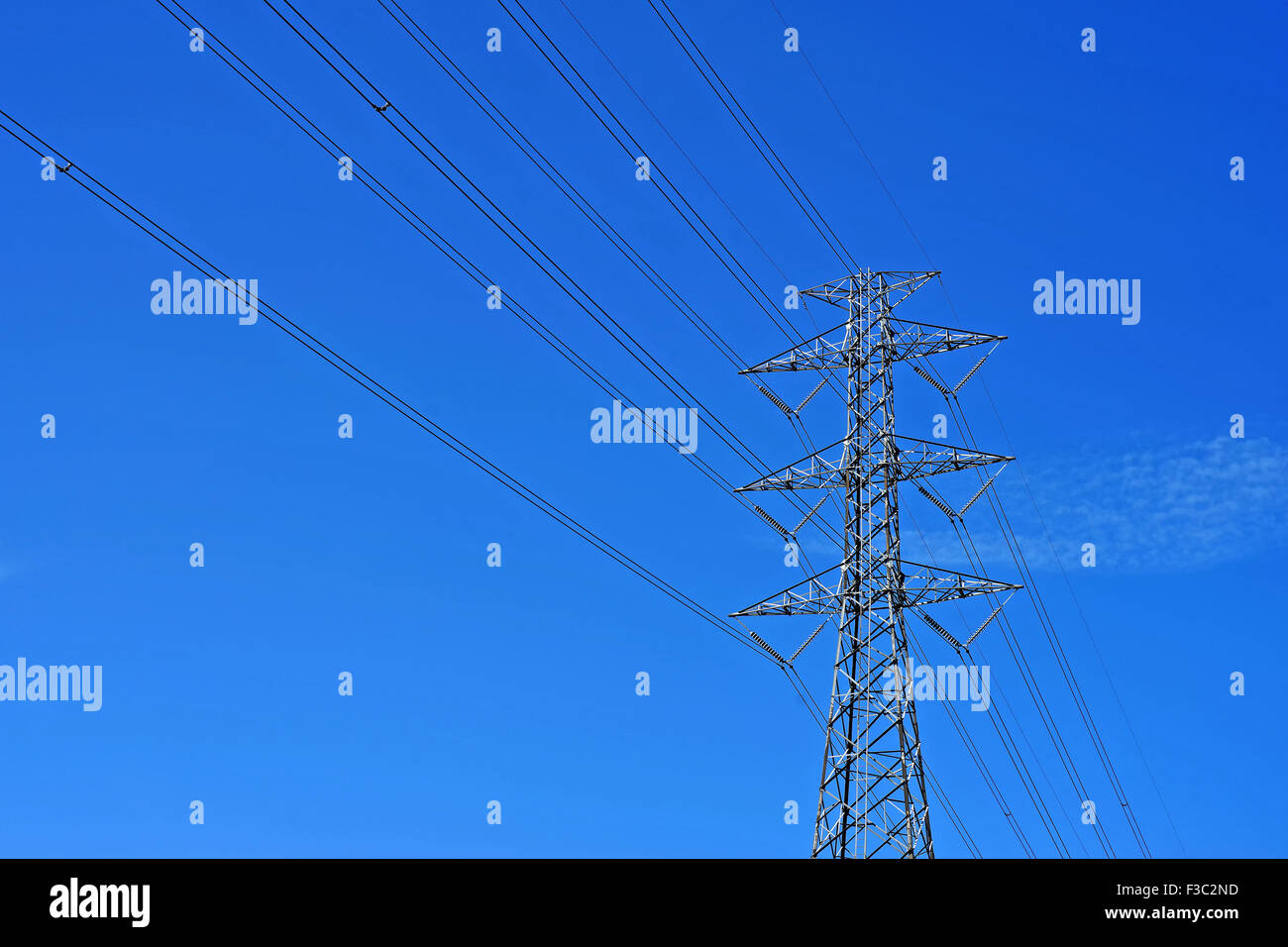High voltage electric tower on beautiful sky background Stock Photo - Alamy