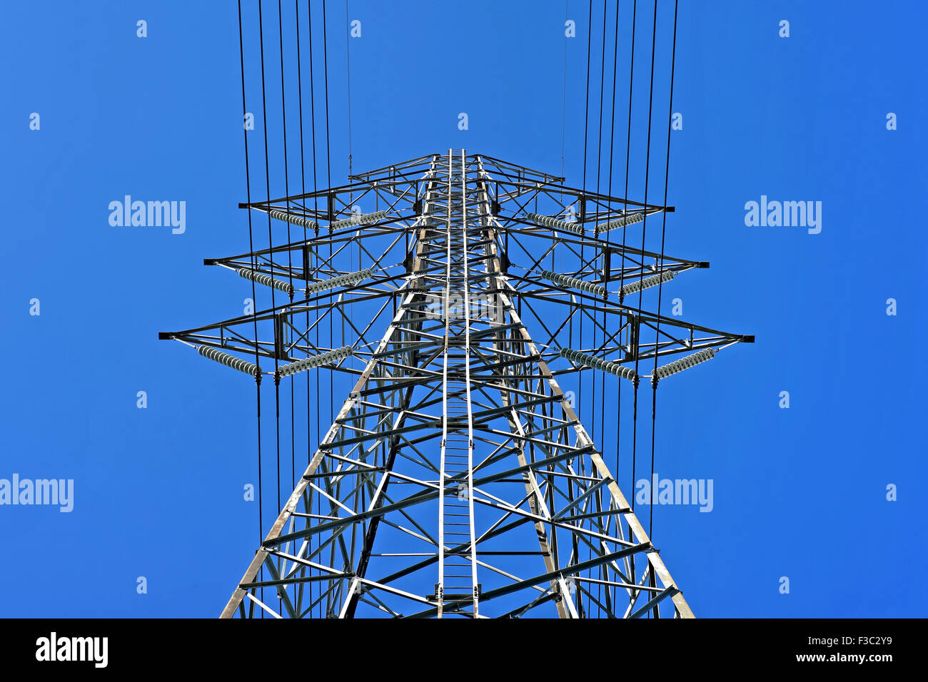 High voltage electric tower on beautiful sky background Stock Photo - Alamy