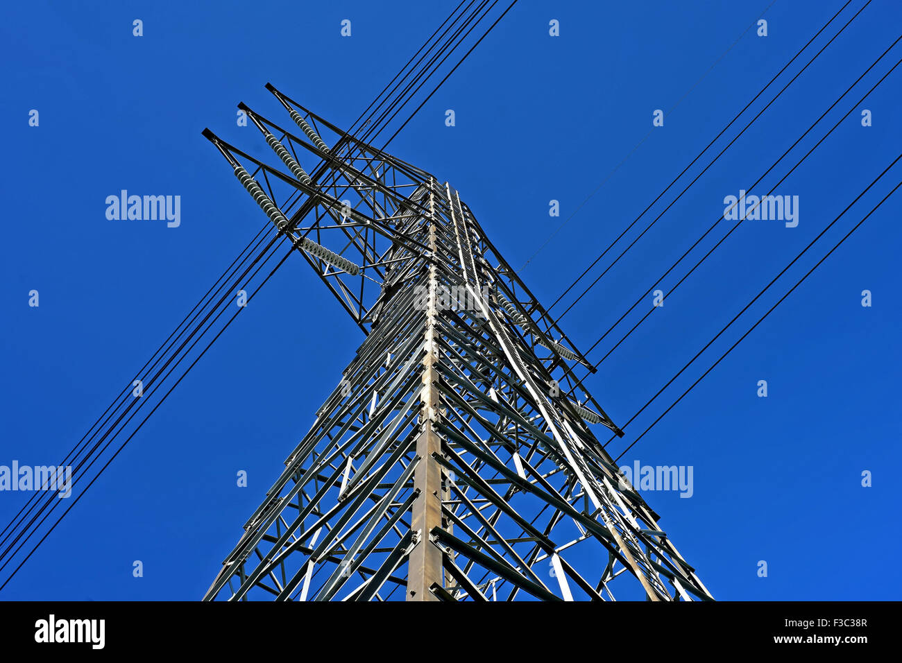 High voltage electric tower on beautiful sky background Stock Photo - Alamy