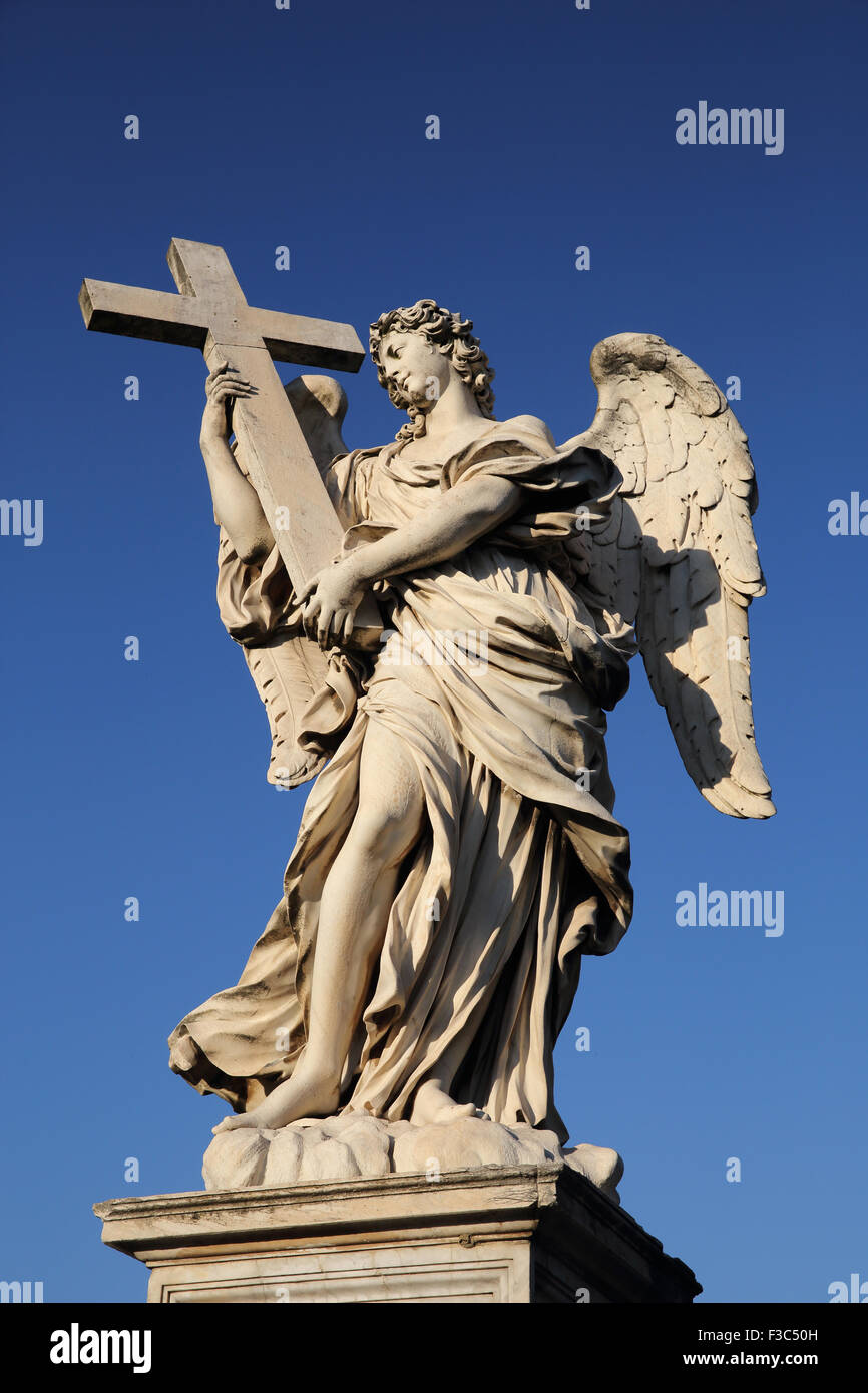 Angel With The Cross statue by Ercole Ferrata on Pont Sant Angelo leading to the Vatican. Stock Photo