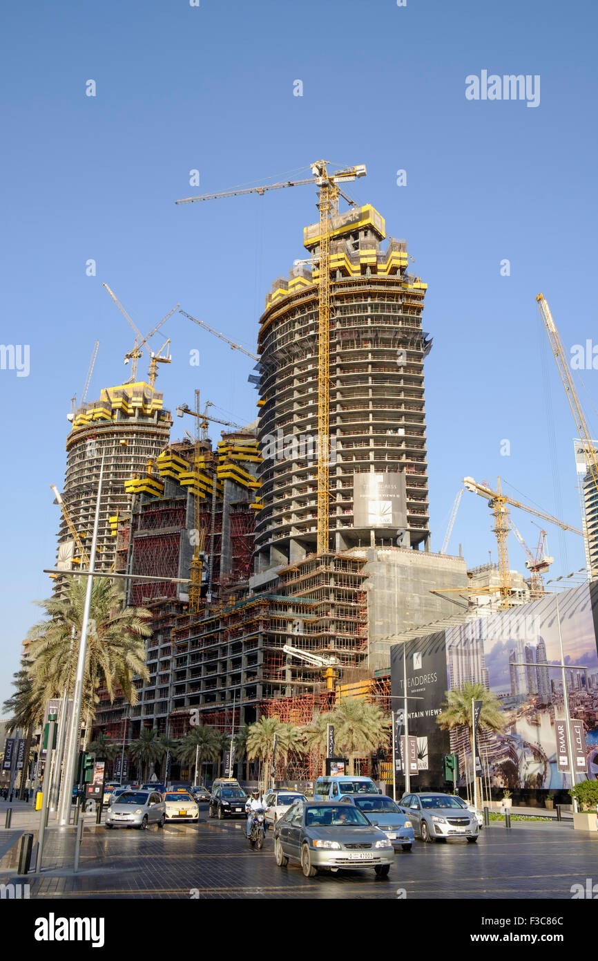 Three high-rise apartment towers under construction in Downtown Dubai ...