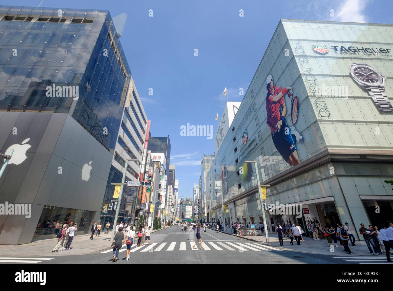 Busy street in upmarket shopping district of Ginza in Tokyo Japan Stock Photo