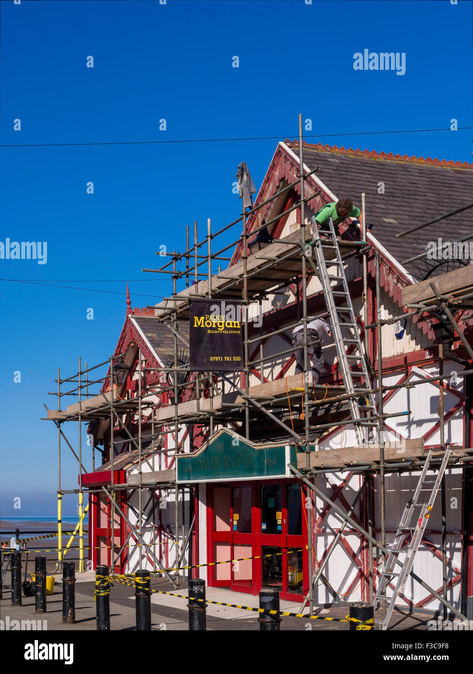 Repair and refurbishment of Saltburn Pier scaffolded for stripping and repainting Cleveland North Yorkshire England UK Stock Photo