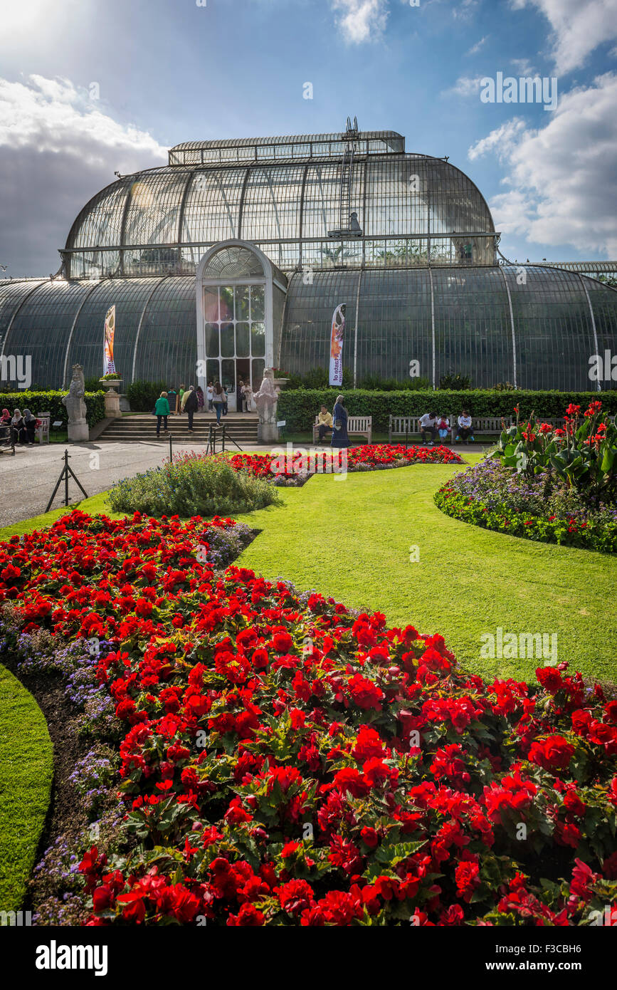 Colourful flowerbeds in front of the Palm House at Kew Gardens, London, UK Stock Photo