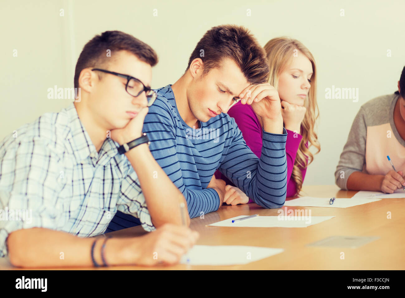 group of students with papers Stock Photo Alamy