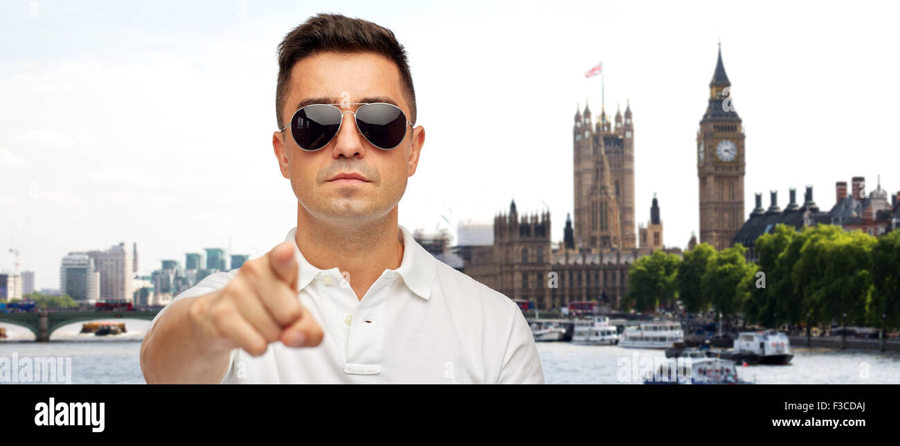 man in sunglasses pointing finger on you Stock Photo - Alamy