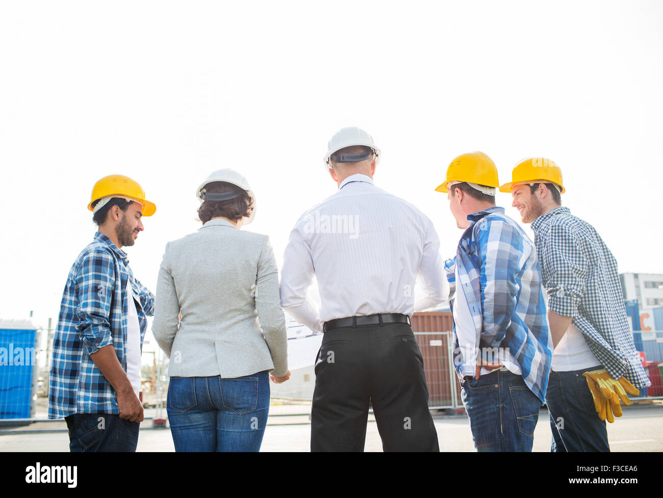 group of builders and architects at building site Stock Photo Alamy
