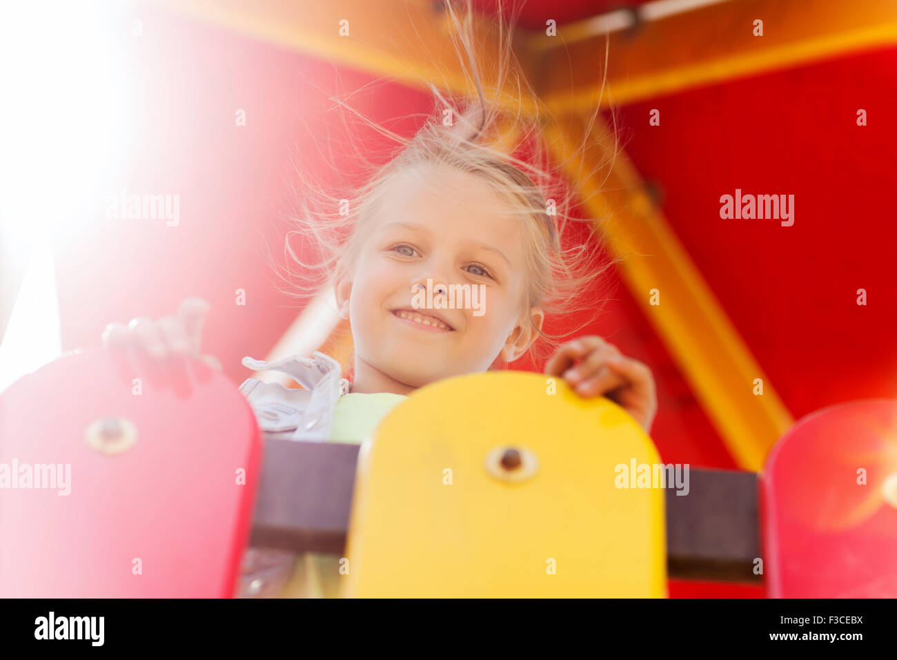 happy little girl on children playground Stock Photo - Alamy