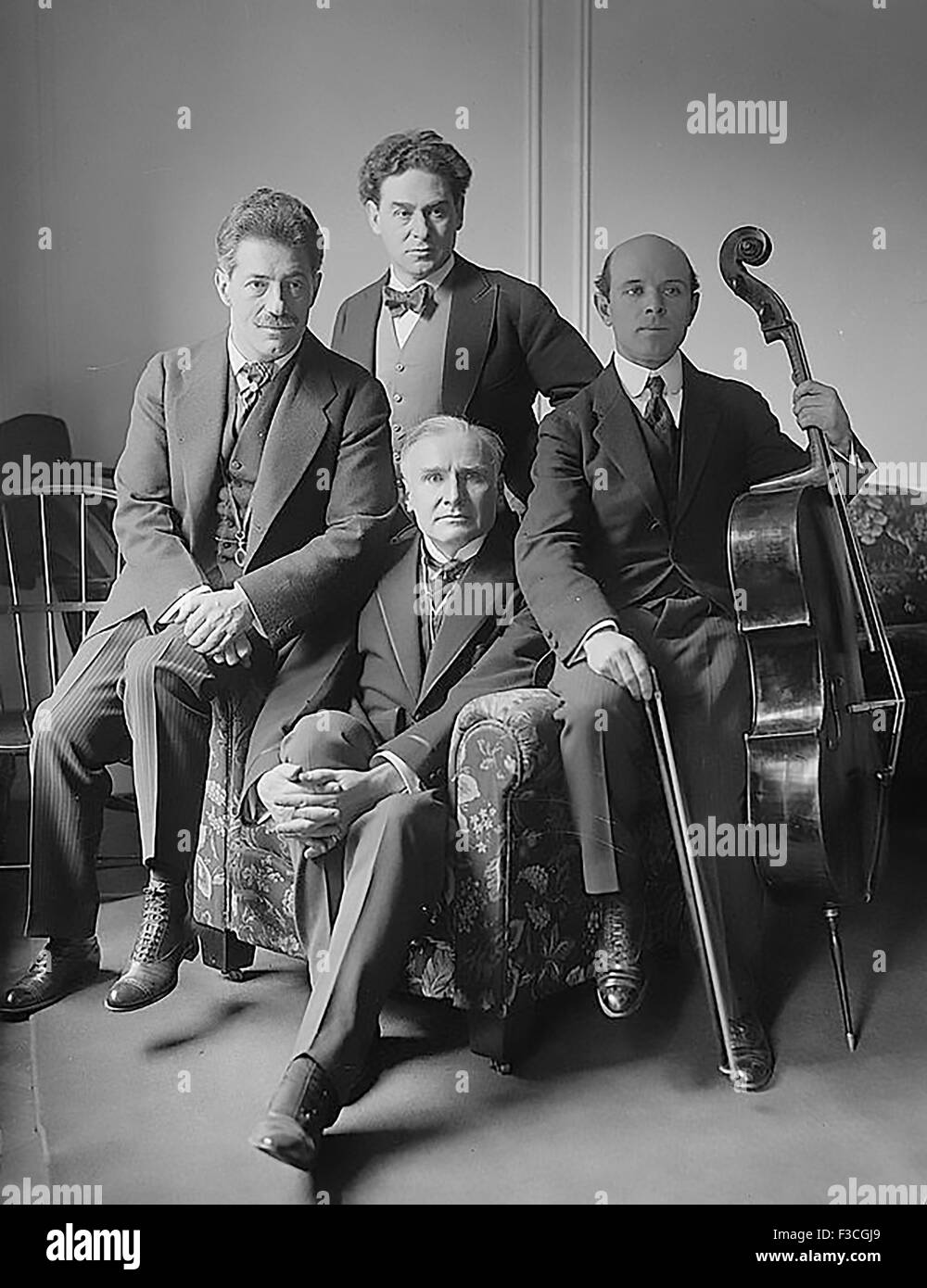 FRITZ KREISLER at left on 13 March 1917 with Harold Bauer standing behind Walter Damrosch and