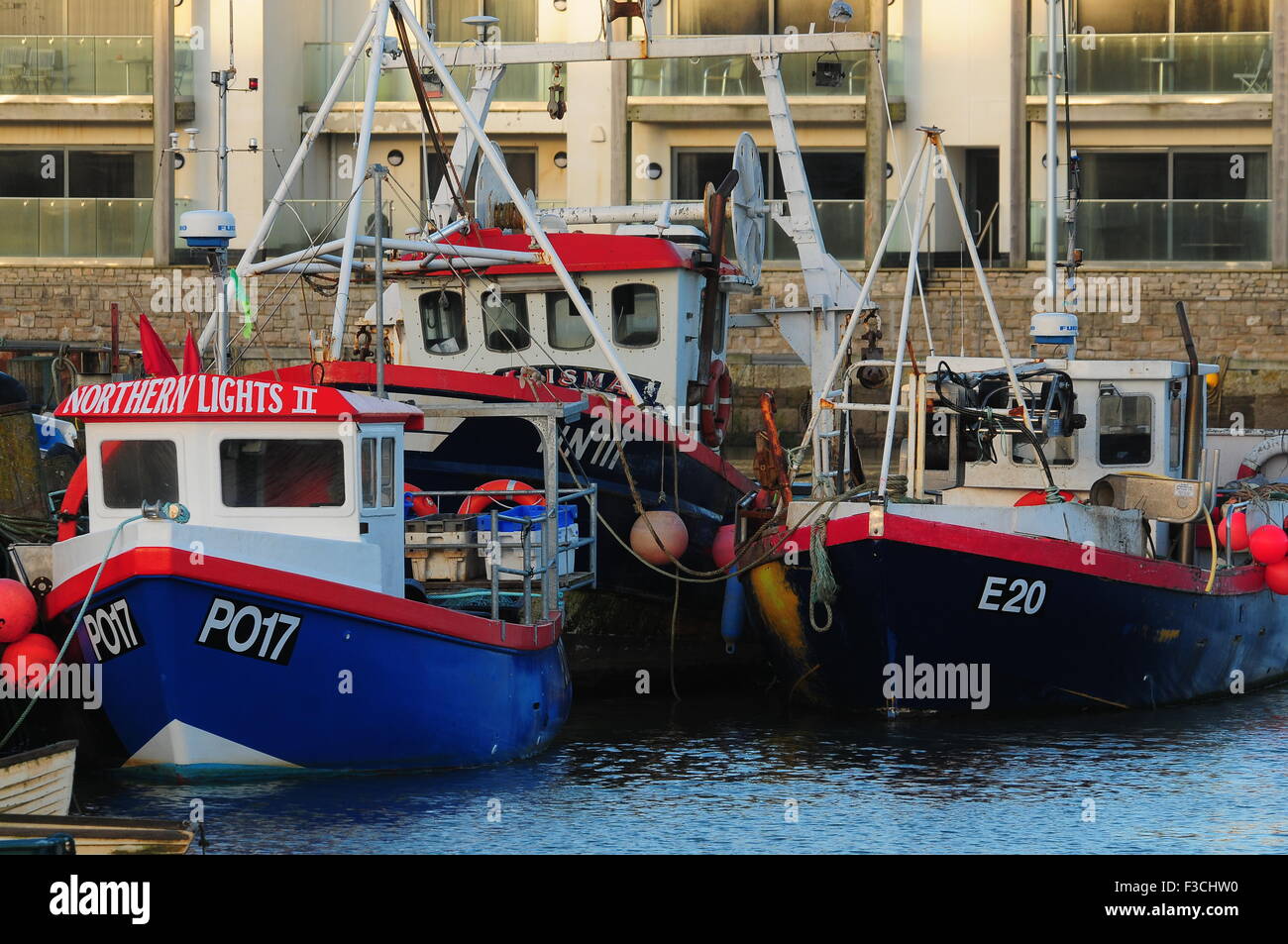 Fishing boats at West Bay harbour Dorset UK Stock Photo - Alamy