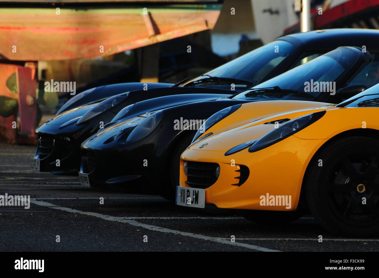Three sports cars parked in a row UK Stock Photo