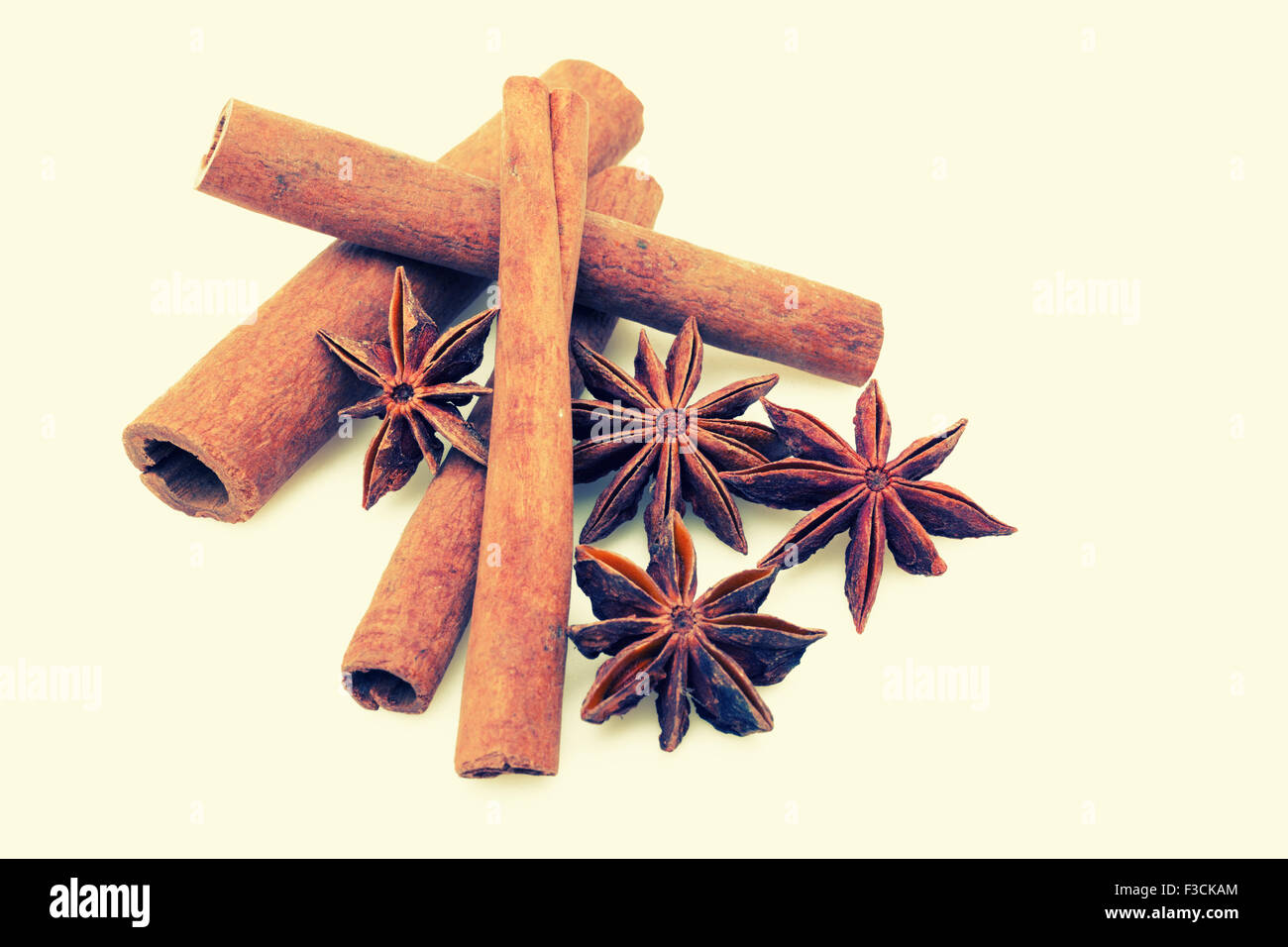 Star anise with cinnamon sticks on white Stock Photo