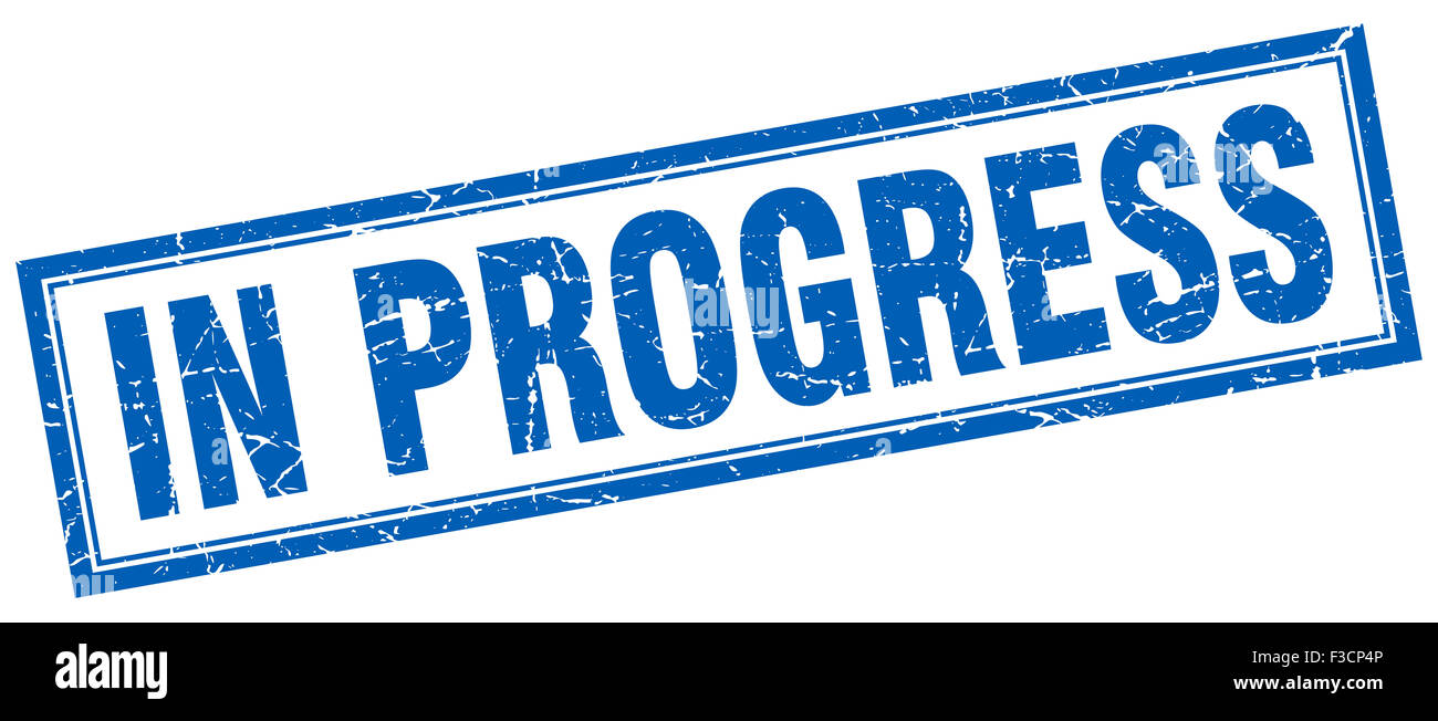 in progress blue square grunge stamp on white Stock Photo - Alamy