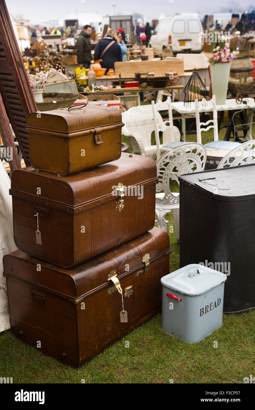 UK, England, Lincolnshire, Lincoln, Antiques Fair, stack of tin trunks for sale Stock Photo