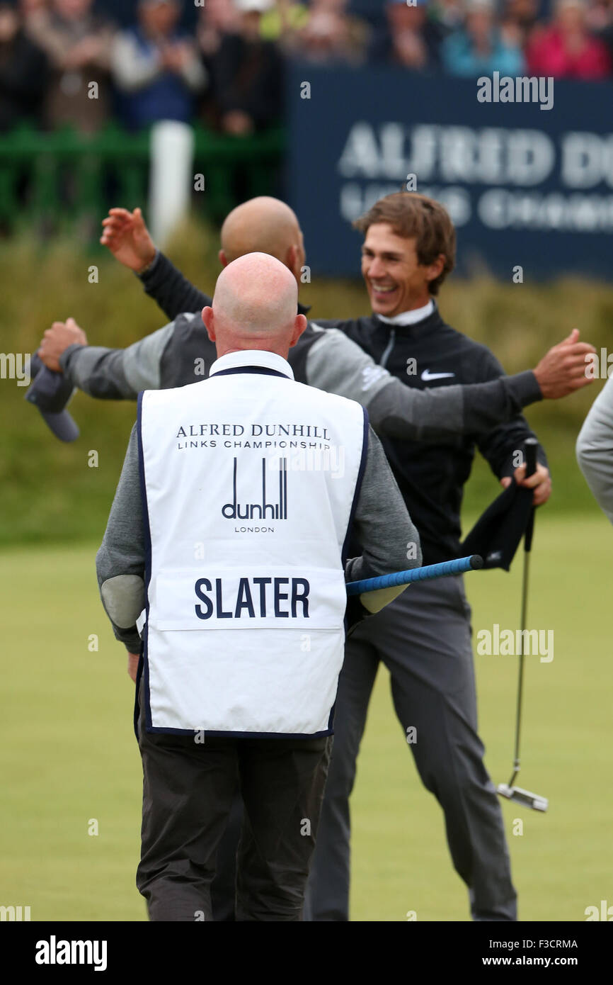 St Andrews, Scotland. 04th Oct, 2015. Alfred Dunhill Links Golf final round. Thorbjorn Olesen is congratulated by his playing partner Florian Fritsch © Action Plus Sports/Alamy Live News Stock Photo