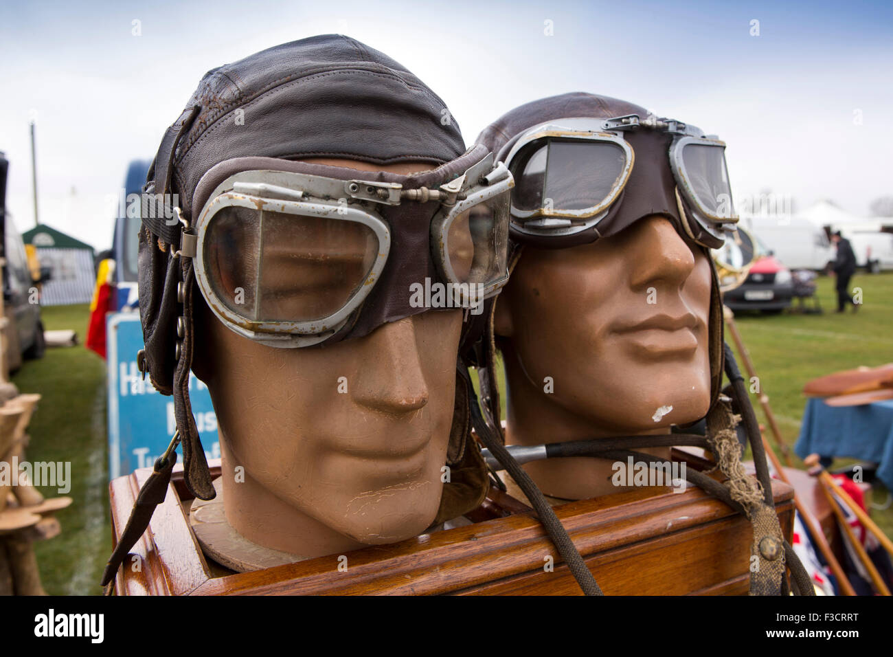 UK, England, Lincolnshire, Lincoln, Antiques Fair, dummy heads wearing leather flying helmets and goggles Stock Photo